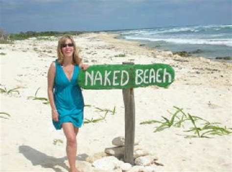 nude milf beach|Naked hot MILF on a nude beach.